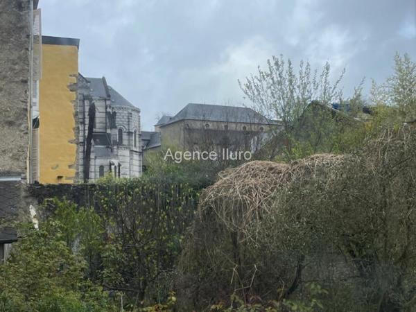 Appartement - Oloron-sainte-marie - Réf.:205286 OLORON CENTRE-VILLE - BEL APPARTEMENT T3 AU CHARME DE L' ANCIEN AVEC JARDIN PRIVATIF ET PARKING PRIVE -