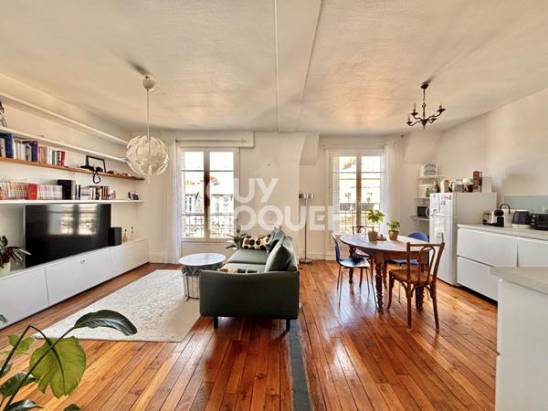 QUARTIER DES PUCES / RUE DES ROSIERS - DERNIER ETAGE 2/3 PIÉCES - 54,23 M² - CAVE