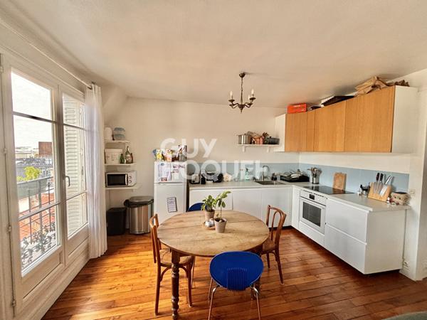 QUARTIER DES PUCES / RUE DES ROSIERS - DERNIER ETAGE 2/3 PIÉCES - 54,23 M² - CAVE