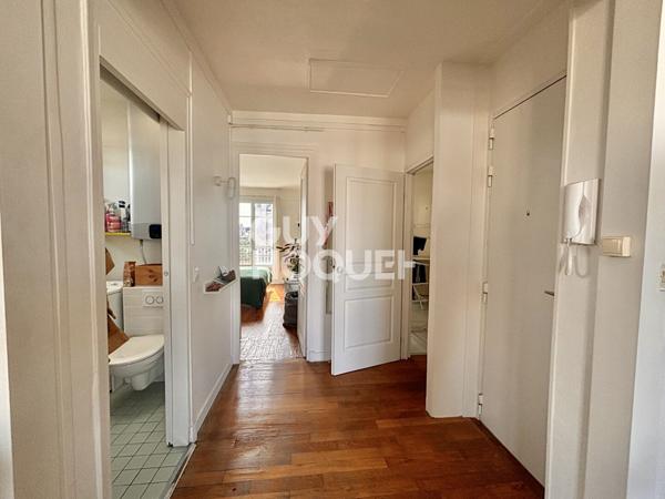 QUARTIER DES PUCES / RUE DES ROSIERS - DERNIER ETAGE 2/3 PIÉCES - 54,23 M² - CAVE