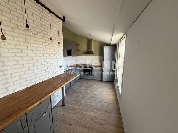 Coup de coeur à Sainte-Anne : Appartement avec garage, vue dégagée & ascenseur