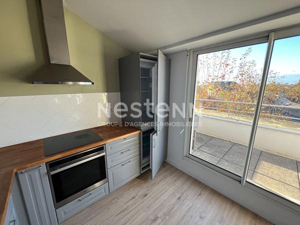 Coup de coeur à Sainte-Anne : Appartement avec garage, vue dégagée & ascenseur