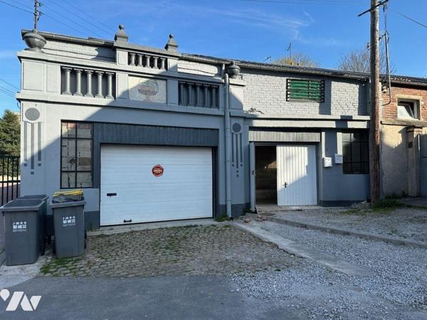 A vndre sur la commune de BAPAUME petit immeuble à proximité du centre ville divisé en 2 appart...