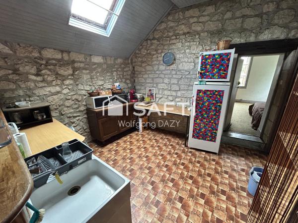 Maison en pierre avec fort potentiel d'aménagement