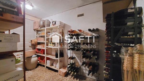 Maison de plain-pied avec hangar