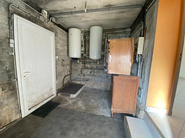 À VENDRE MAISON COMPOSÉE DE 2 APPARTEMENTS À MERDRIGNAC PROCHE DES COMMODITÉS