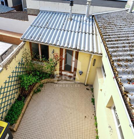 Étaples centre-ville : maison à rénover avec cour plein sud et dépendance