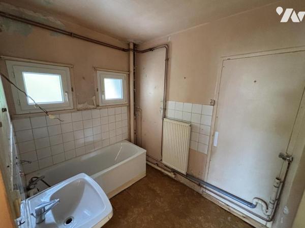 Appartement T3 Bis (env. 65 m² habitables - A rénover), situé à proximité de toutes commodités