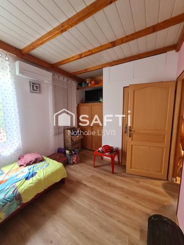 Maison semi mitoyenne rénovée dans un quartier calme avec pompe à chaleur, climatisation et garage double