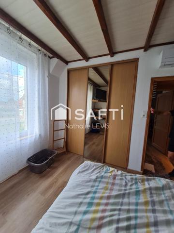 Maison semi mitoyenne rénovée dans un quartier calme avec pompe à chaleur, climatisation et garage double