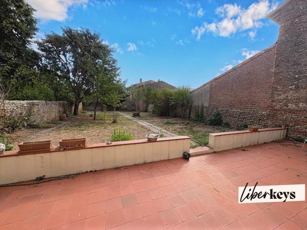 Maison T5 avec jardin, garage et vaste potentiel d’aménagement
