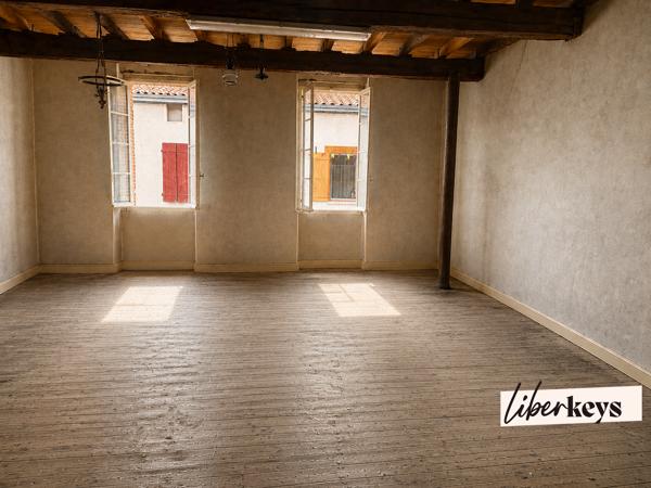 Maison T5 avec jardin, garage et vaste potentiel d’aménagement