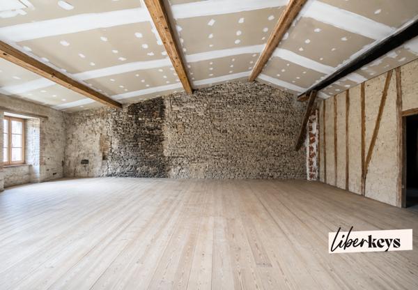 Maison T5 avec jardin, garage et vaste potentiel d’aménagement