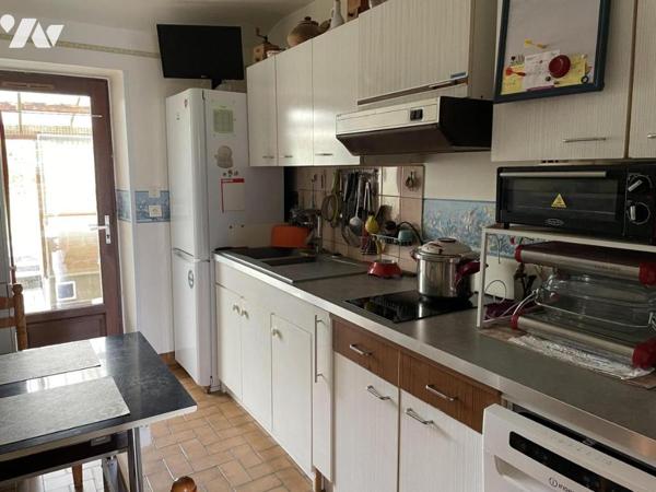 BASSE GOULAINE - ENSEMBLE IMMOBILIER À RÉNOVER