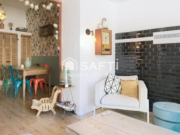 MAISON DE VILLE AVEC EXTÉRIEUR SUR TROIS NIVEAUX