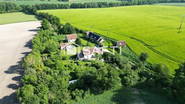 Ancienne ferme de 130m² avec terrain arboré de 9 330 m², nombreuses dépendances et potentiel touristique