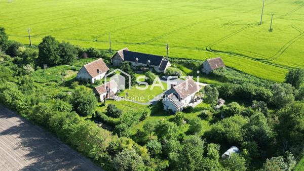 Ancienne ferme de 130m² avec terrain arboré de 9 330 m², nombreuses dépendances et potentiel touristique
