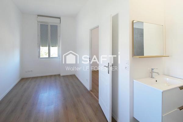 APPARTEMENT T2 DE 31 m² AVEC PLACE DE PARKING ET JARDIN PRIVATIF