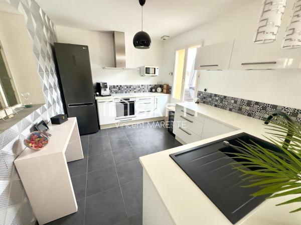 Maison familiale avec jardin, garage et confort moderne