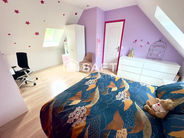 Maison familiale avec jardin, garage et confort moderne