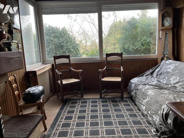 Maison nichée au coeur d'une végétation luxuriante