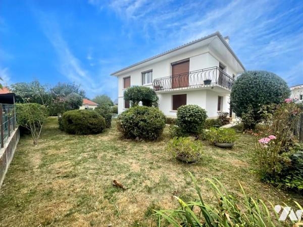 Villa avec jardin, 4 chambres et garage