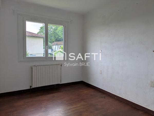 Maison sur sous-sol des années 70, Beau potentiel