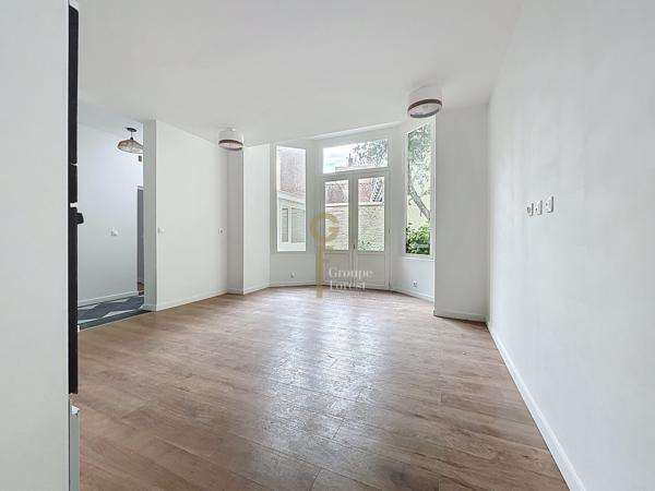 Appartement en RDC avec belle cour