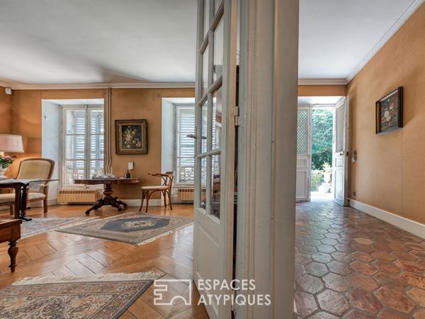 La maison familiale à réinventer avec son jardin dans un quartier recherché