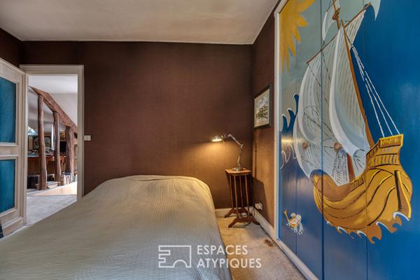 La maison familiale à réinventer avec son jardin dans un quartier recherché