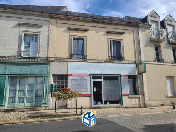 Immeuble avec appartements et commerce