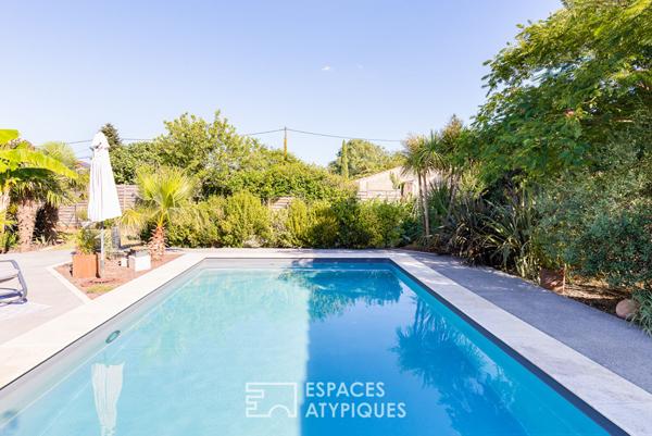 Charmante maison de ville avec piscine et jardin paysagé