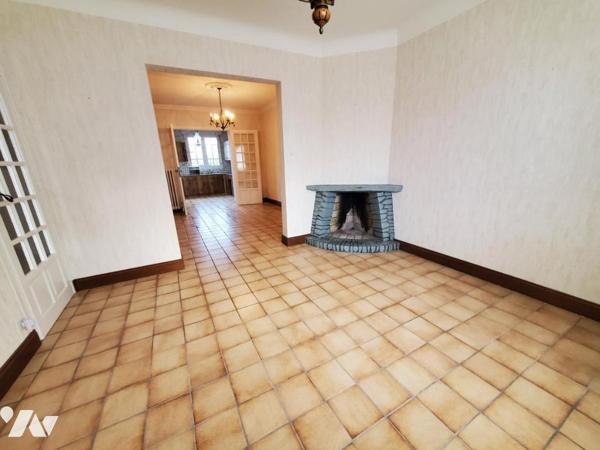 TOURLAVILLE - MAISON de 95m² habitables avec cour et jardin. bien placée pour toute commodité