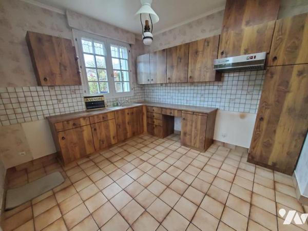 TOURLAVILLE - MAISON de 95m² habitables avec cour et jardin. bien placée pour toute commodité