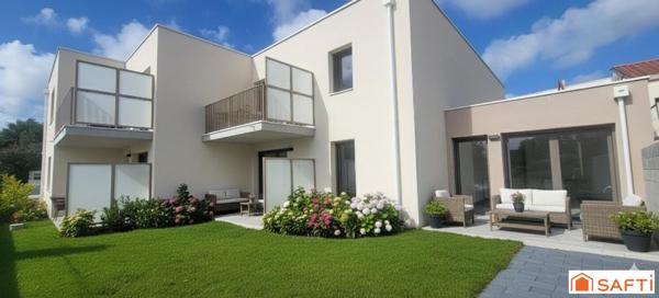 APPARTEMENT  AVEC JARDINET PRIVATIF