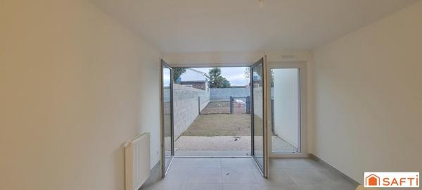 APPARTEMENT  AVEC JARDINET PRIVATIF