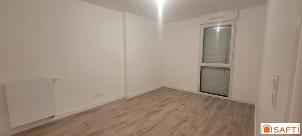 APPARTEMENT  AVEC JARDINET PRIVATIF