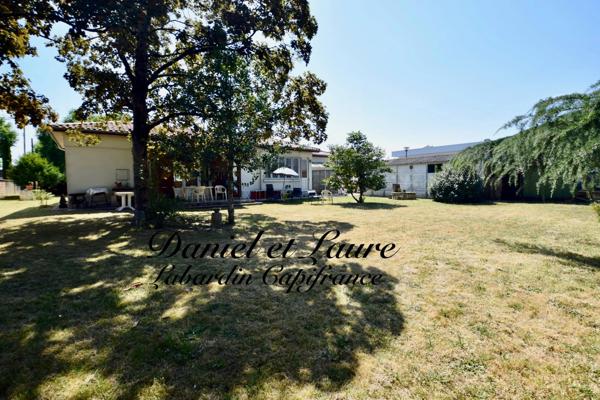 Maison de plain-pied - 4 chambres - garage - terrain clos