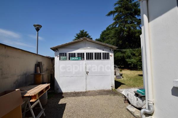 Maison de plain-pied - 4 chambres - garage - terrain clos
