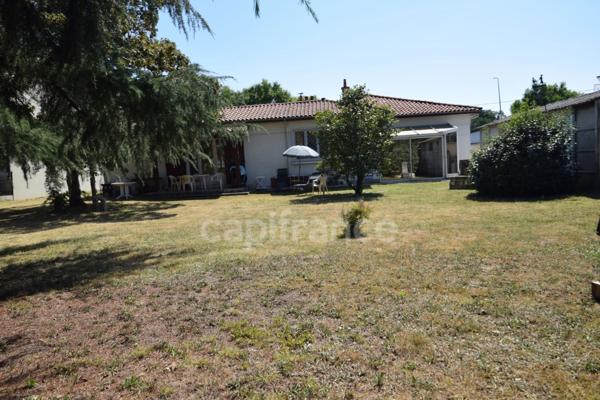 Maison de plain-pied - 4 chambres - garage - terrain clos