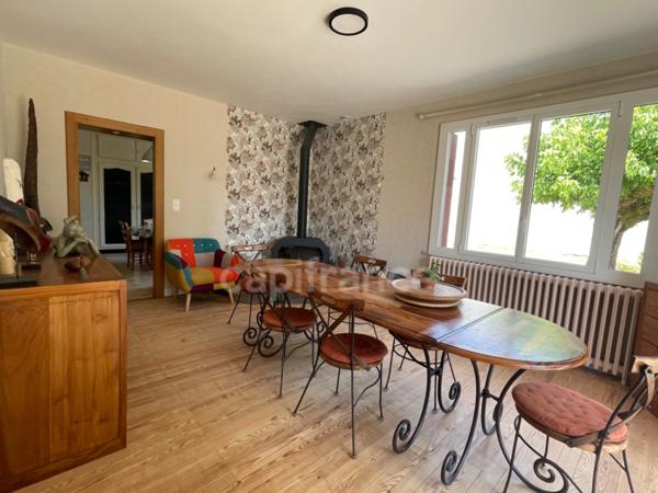 Maison de plain-pied - 4 chambres - garage - terrain clos