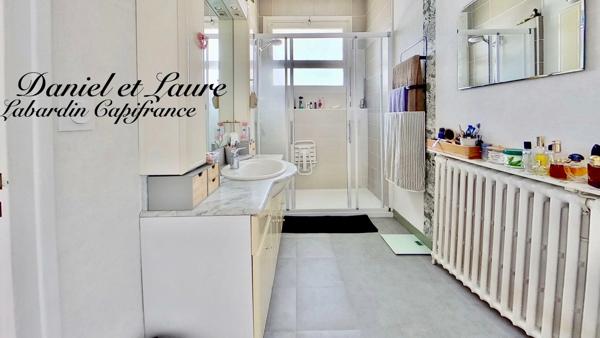 Maison de plain-pied - 4 chambres - garage - terrain clos