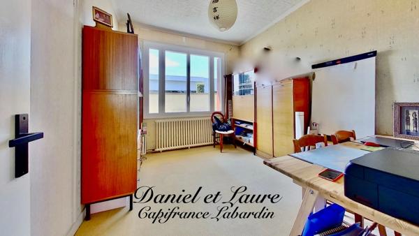 Maison de plain-pied - 4 chambres - garage - terrain clos