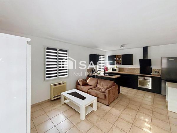 Au cœur d’une charmante copropriété de village