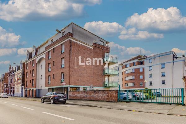 Appartement t3 - 59.29 m² - cave + pkg