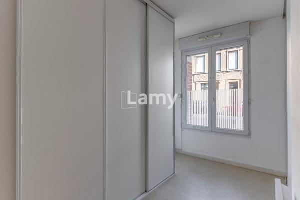 Appartement t3 - 59.29 m² - cave + pkg