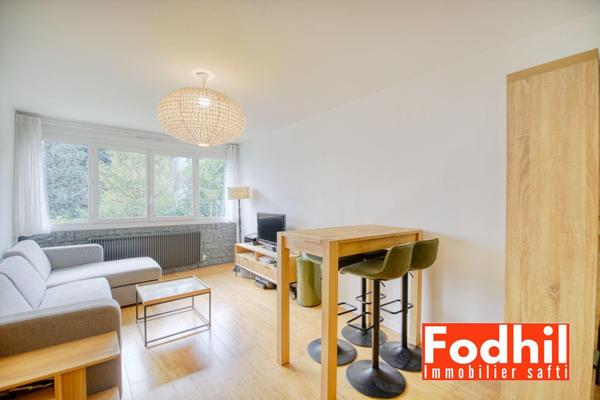 Appartement 3 pièces de 65m² avec cave et parking.