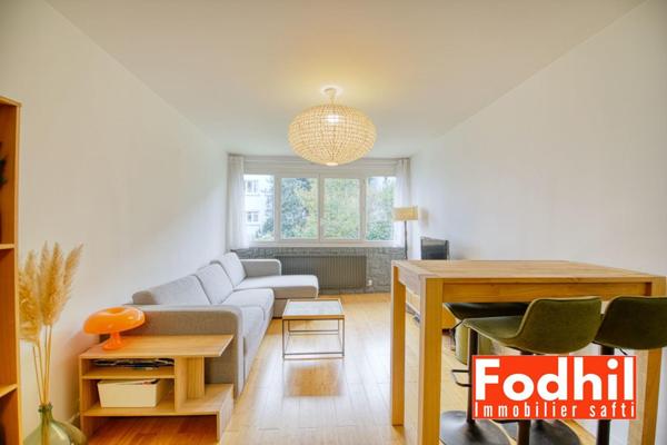 Appartement 3 pièces de 65m² avec cave et parking.