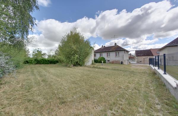 Maison familiale avec fort potentiel et grand jardin