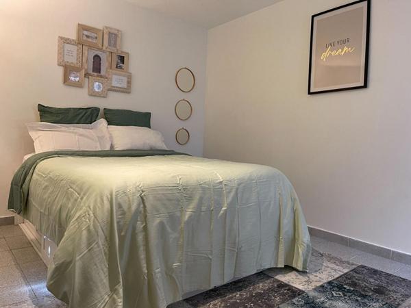 Maison au calme avec potentiel locatif  dans un écrin de verdure